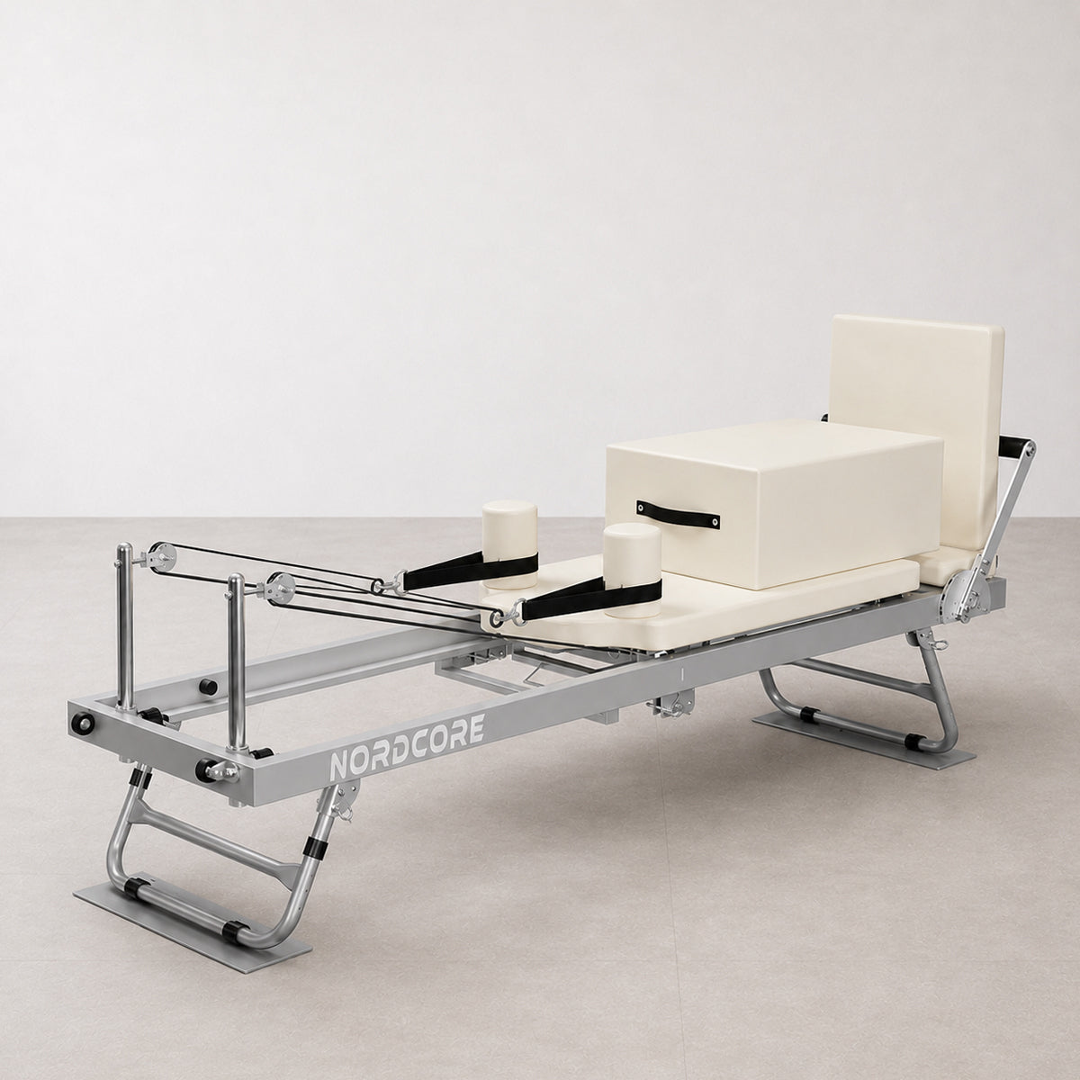 
              Nordcore Pilates Reformer-maskine, sammenklappelig, hvid